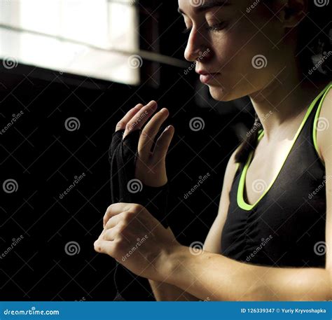 Closeup Fit Woman Wrapping Hands With Bandage Tape Preparing For Boxing