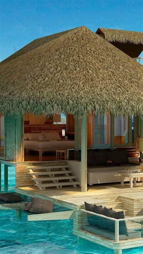 Overwater Bungalows In The Olhuveli Island Maldives Backiee
