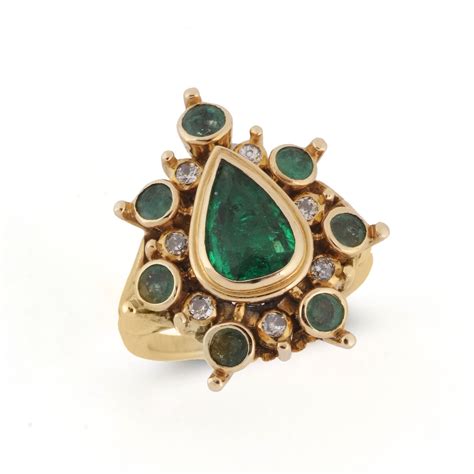 Rene Boivin An Emerald And Diamond Hindou Ring Of Stylised Indian Design The Central Collet