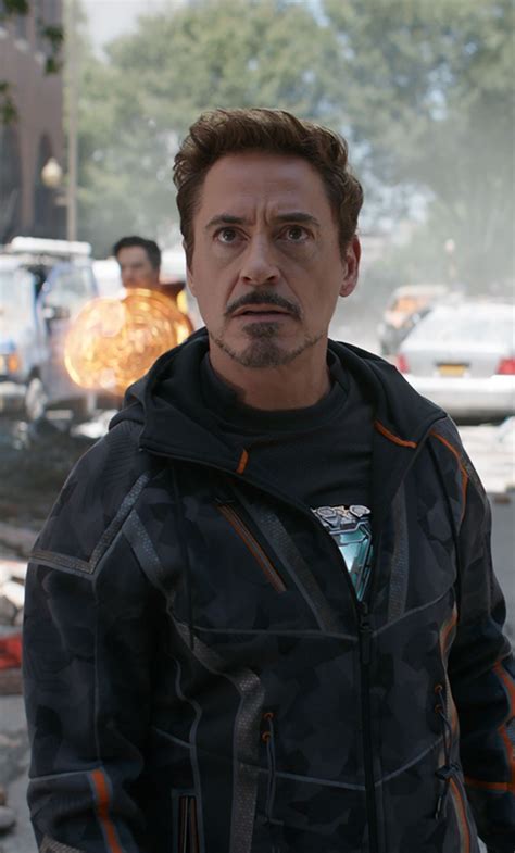 Infinity war set show tony stark donning a new camouflage jumpsuit. 1280x2120 Robert Downey As Tony Stark In Avengers Infinity ...