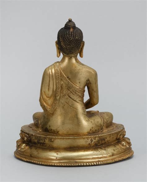 Lot Sino Tibetan Gilt Bronze Figure Of Buddha Seated In Lotus Posture On A Two Tier Lotus Base