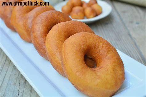 Stir the warm milk mixture into the yeast along with the 1/2 cup of. Nigerian Doughnut recipe - How to make the Nigerian ...