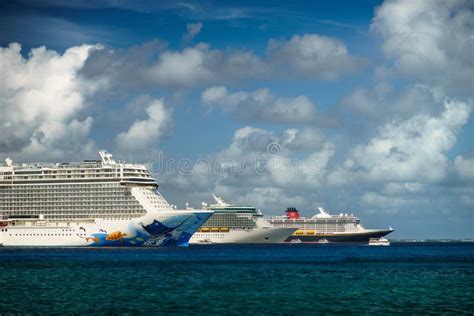 Three Cruises Ship In Crystal Blue Water With Beautiful Sky Editorial