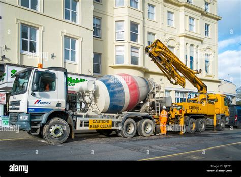 Truck Mounted Mobile Concrete Mixer And A Mobile Concrete Pump Setting