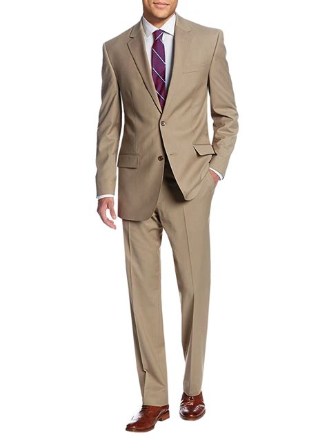 Our men's suits celebrate the best combination of trend and tradition. Mens Brown 2 Button modern fit suits by Salvatore Exte ...