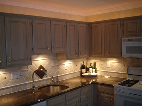 Rope Lights Above Cabinets In Kitchen