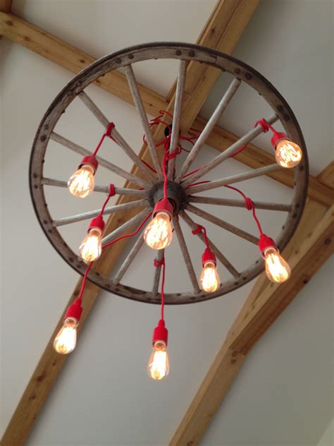 Rustic Light Fixture Light Bulbs And An Old Barn Wheel Rustic Light