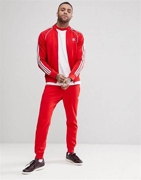 Free delivery over €25 & 60 days free returns. adidas Originals adicolor Tracksuit in Red | Red adidas ...