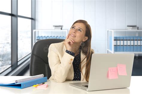 Woman At Office Working At Laptop Computer Desk Smiling Happy