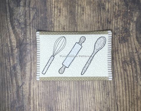 This type of kitchen is popular now a day because the size of the kitchen is in square form. ITH Kitchen Utensil Placemat. Designed to look like Free ...