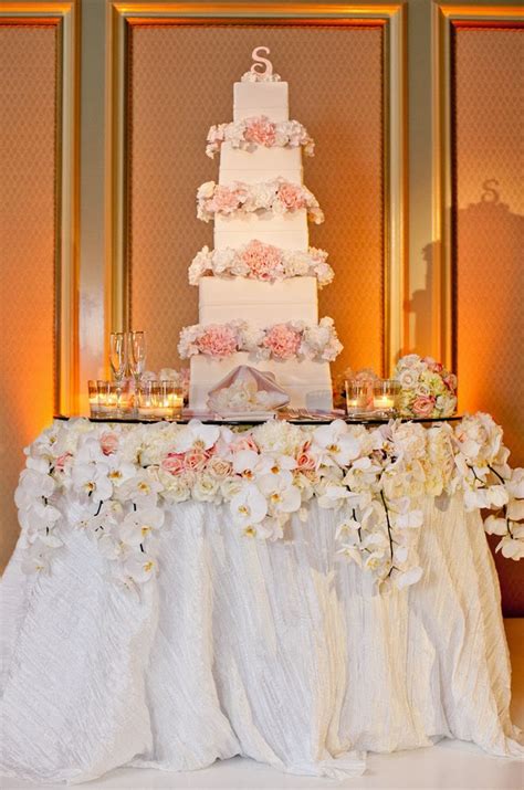 Fabulous Wedding Cake Table Ideas Using Flowers | The Wedding Blog