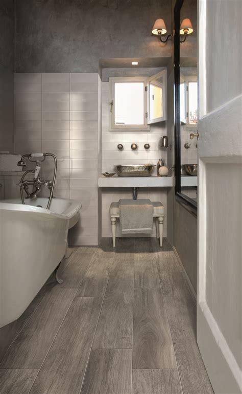 Vertically laid tiles instantly modernize a bathroom. 27 pictures and ideas of wood effect bathroom floor tile 2020