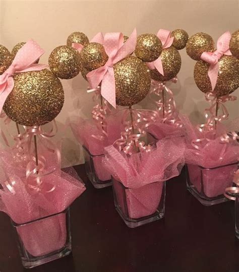 Pink and gold is a very elegant theme for a baby shower and there are so many gorgeous decorations, printables and ideas you can use to games are the main part of a baby shower oh besides opening all your gorgeous gifts. You can get most of these supplies from the Dollar Store. Spray foam balls with … | Minnie mouse ...