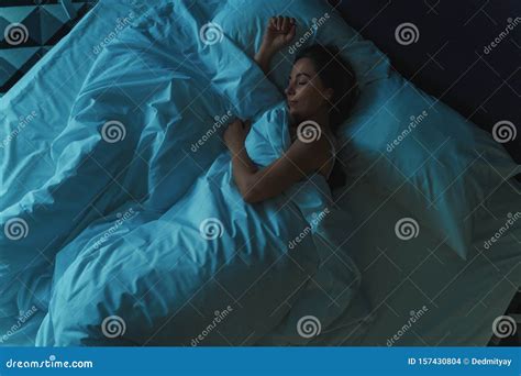 Young Beautiful Girl Or Woman Sleeping Alone In Big Bed At Night Top