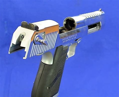 What better way to see what custom shops can really do but by giving them a whole lot of gun on which to showcase their skills? Magnum Research, Inc. Model Desert Eagle .50 Ae Cal Semi ...