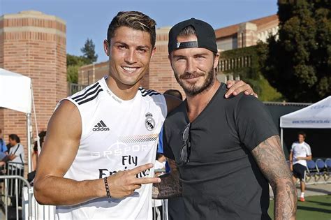david beckham poses with cristiano ronaldo as he attends real madrid training session in la