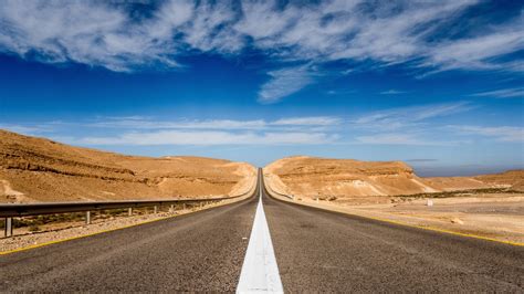 Road Between Desert Under Cloudy Blue Sky 4k 5k Hd Nature Wallpapers
