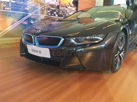 Bmw I8 Front View With Open Doors Isolated White On Display At Welt