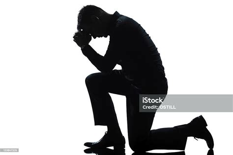 Silhouette Man Kneeling Sadness Praying Full Length Stock Photo