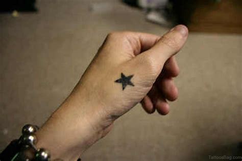 29 Star Tattoos On Hand Tattoo Designs