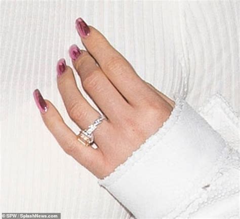 Kylie Jenner Keeps Fans Guessing As She Rocks A Diamond Ring On Her