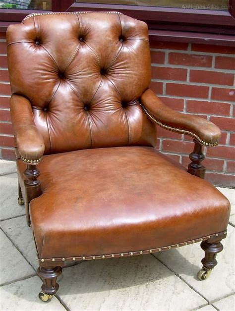 Mid victorian leather buttoned tub club chair, in excelle. A Victorian Leather Armchair - Antiques Atlas