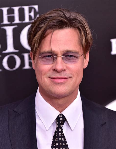 tinted glasses are the secret to happiness at least according to me and brad pitt