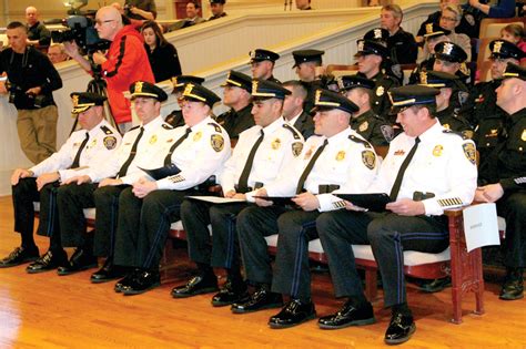 8 police officers promoted, SWAT team honored at ceremony | Cranston Herald