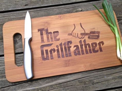 A Wooden Cutting Board With A Knife And Some Onions On It Next To The