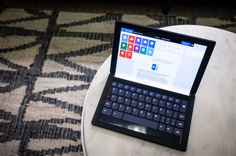 Led battery status displays on the side, and when you do need a more juice, simply fold the device around the keyboard to charge wirelessly. Lenovo's foldable tablet is called the ThinkPad X1 Fold ...