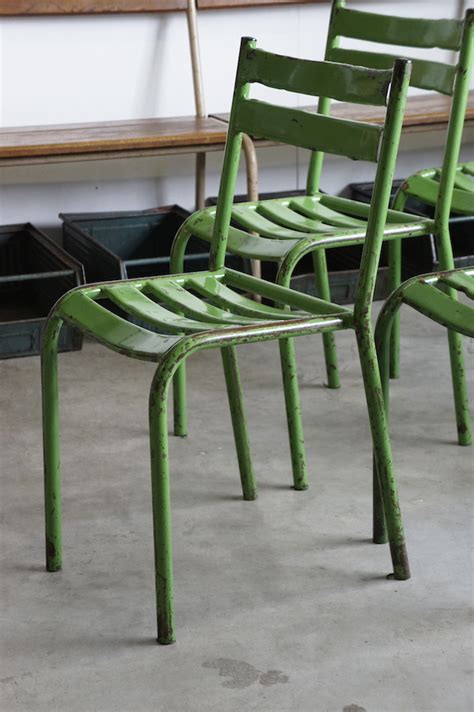 This chair features a modern curved slat style back to keep you comfortable and a textured seat for safe. Sold : French Metal Cafe Chairs - Green