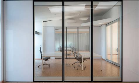 Advanced solution system.the panel used can be standard (single bend/flat) or with a step shape (double bend/step) and screws are fastened from outside the frame. AMWalls | ADG100 - Double Glazed Moveable Wall System