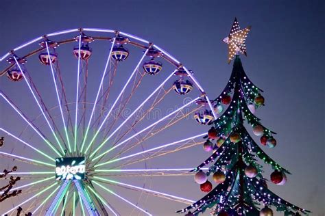 Ferris Wheel And Christmas Tree Editorial Photography Image Of Market
