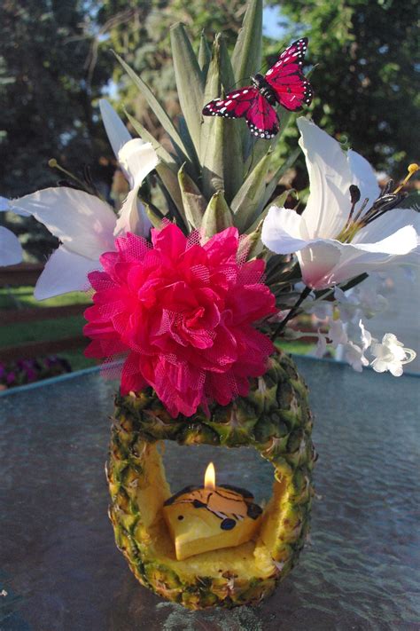 With A Hawaiian Theme We Created These Centerpieces Out Of Pineapples