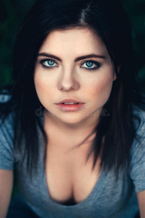 Closeup Portrait Of Beautiful Young Caucasian Woman With Black Hair