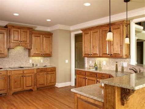 For a more traditional look, this kitchen features dark chocolate brown cabinets. 35+ Beautiful Kitchen Paint Colors Ideas with Oak Cabinet - Page 29 of 37