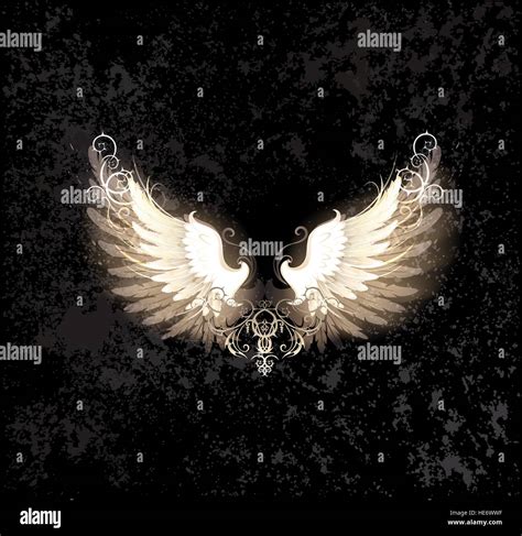 Glowing Angel Wings Decorated With A Pattern On A Dark Textural