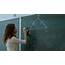 Young Teacher Erasing Chalkboard Stock Video Footage  Storyblocks