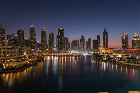 Dubai Singing Fountains At Night Lake View Between Skyscrapers City