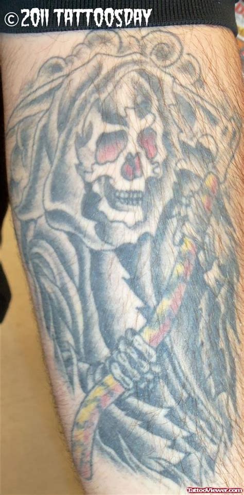 Unique Grey Ink Grim Reaper Tattoo On Leg