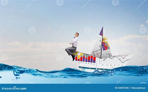 Businessman In Boat Made Of Paper Stock Photo Image Of Achievement