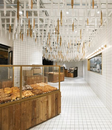 Rolling Pins Hang From Ceiling Inside Beijing Bakery By Blue