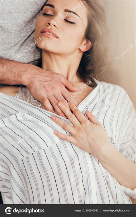 hombre tocando pecho de la mujer sensual fotografía de stock © arturverkhovetskiy 156650550