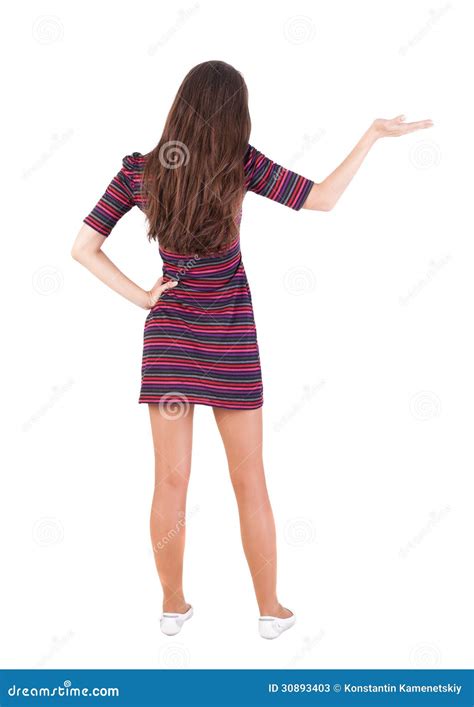 Back View Of Beautiful Woman In Looking At Wall And Holds Stock Photos