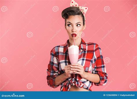 Portrait Of A Cheerful Brunette Pin Up Girl In Plaid Shirt Stock Photo