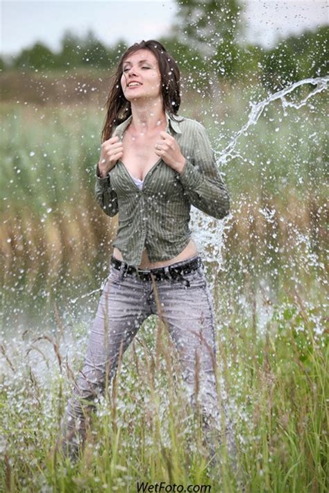 Pretty Woman Get Wet In Light Jeans Shirt And Shoes With Heels Wetfoto Com