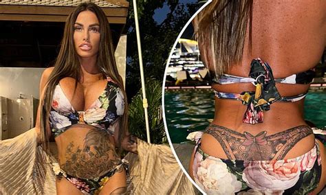Katie Price Shows Off Huge New Thong Tattoo On Her Lower Back As She Strips Down To A Floral