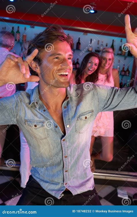 Young Man Having Fun In Busy Bar Stock Photo Image Of Busy Enjoying