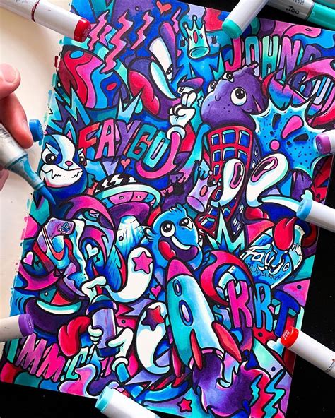 A Person Holding Two Crayons In Their Hands While Drawing Graffiti On A
