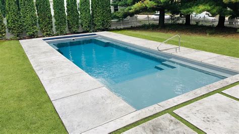 The Illusion Fiberglass Swimming Pool With Splash Pad Imagine Pools
